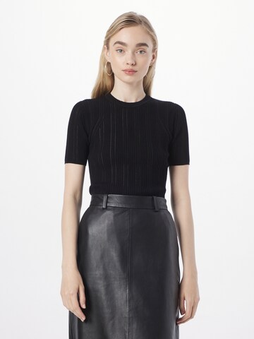 3.1 Phillip Lim - Jersey en negro: frente