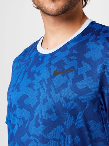 NIKE Sportshirt 'Superset' in Blau