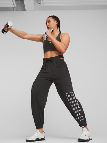 Loosefit Pantaloni sportivi di PUMA in nero