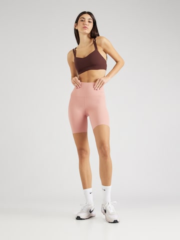 NIKE Skinny Sportbroek 'ZENVY' in Rood