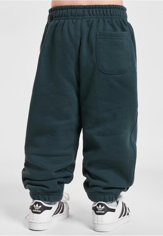 Tapered Pantaloni di Urban Classics in verde