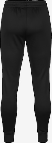 UNDER ARMOUR Zúžený Sportovní kalhoty – černá