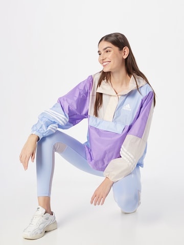 ADIDAS SPORTSWEAR Športna jakna 'Wind.Rdy' | vijolična barva