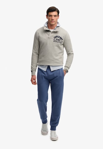 Superdry Tapered Hose in Blau