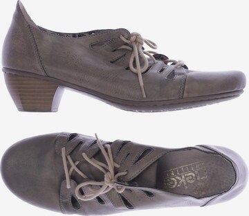 Rieker Flats & Loafers in 39 in Grey: front