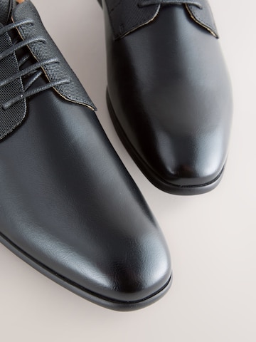 Chaussure à lacets Next en noir