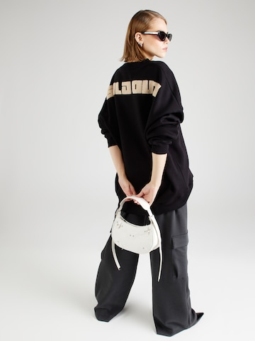 Karo Kauer Sweatshirt 'Sold Out' i svart