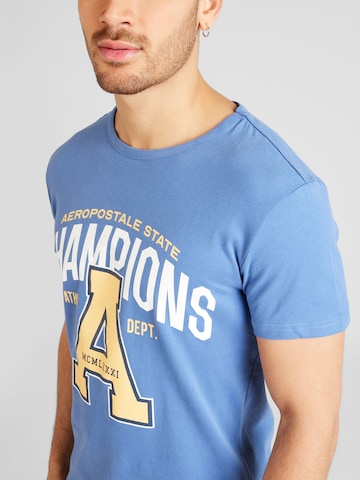 AÉROPOSTALE Shirt 'CHAMPIONS' in Blauw