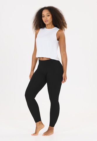 Athlecia Skinny Sports trousers 'Emarri' in Black: front