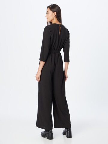 Tuta jumpsuit 'Antonie' di ABOUT YOU in nero