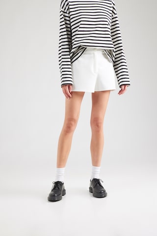 ABOUT YOU Loose fit Trousers 'Justine' in White: front