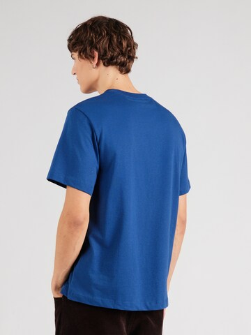 Tricou de la Calvin Klein Jeans pe albastru: spate