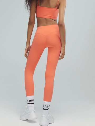 DRILLS Apparel Skinny Leggings 'ACTIVE Scrunch Leggings' in Orange