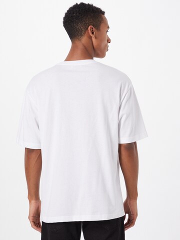 T-Shirt 'Finn' by Jannik Stutzenberger' ABOUT YOU Limited en blanc