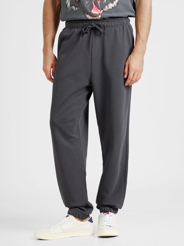 Tommy Jeans Tapered Trousers in Grey: front