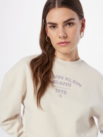 Calvin Klein Jeans Bluzka sportowa w kolorze beżowy