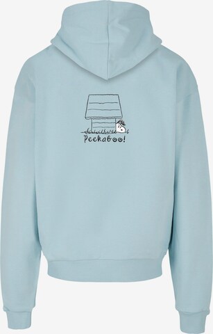 Merchcode Sweatshirt 'Peanuts - Peekaboo' in Blauw