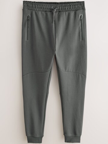 Tapered Pantaloni di Next in grigio