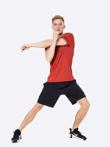 UNDER ARMOUR Regular fit Performance shirt in Red