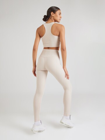 Girlfriend Collective Skinny Sports trousers in Brown
