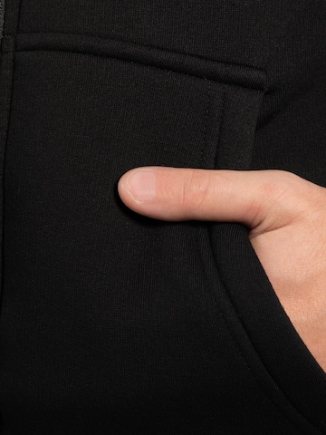 Veste de survêtement Smilodox en noir