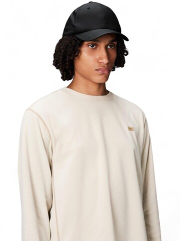 RAINS Cap in Black
