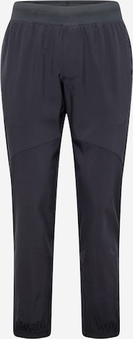 UNDER ARMOUR Tapered Sportbroek in Zwart: voorkant