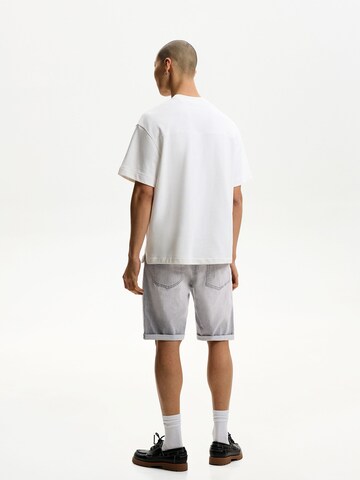 regular Jeans di Bershka in grigio