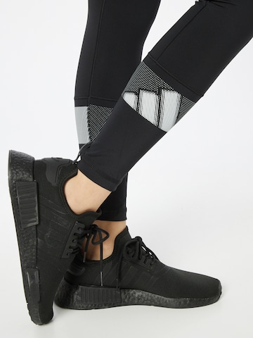 Skinny Pantaloni sportivi di ADIDAS SPORTSWEAR in nero