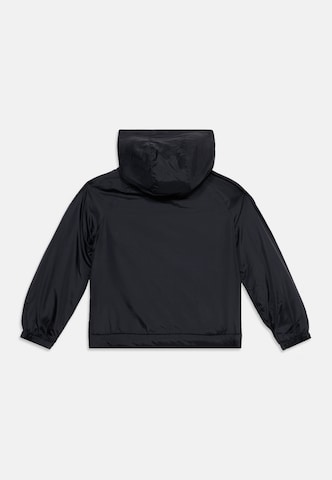 Nike Sportswear - Chaqueta de entretiempo en negro