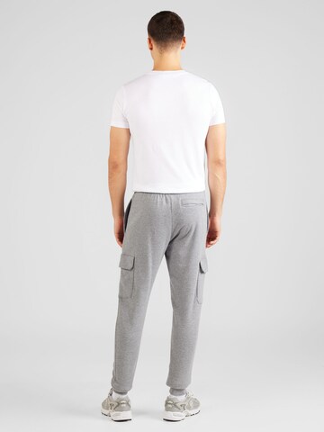 UNDER ARMOUR Tapered Sporthose 'Rival' in Grau