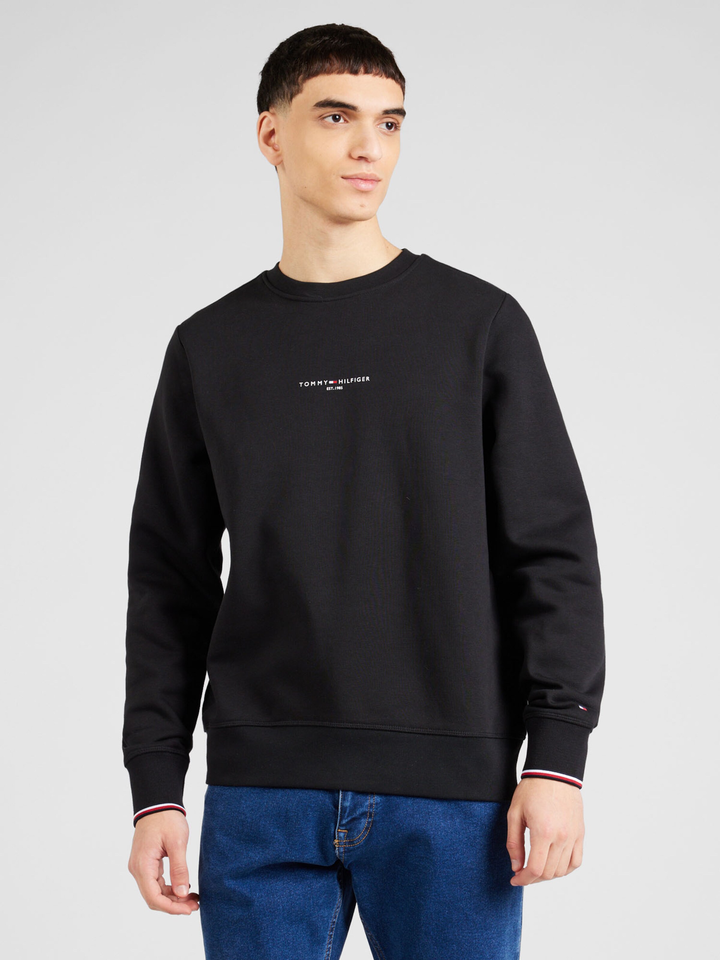 TOMMY HILFIGER Sweatshirt in Black ABOUT YOU