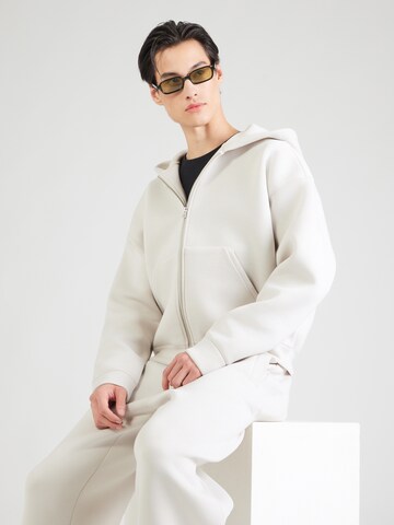 Veste de survêtement 'Simon' WEEKDAY en beige : devant