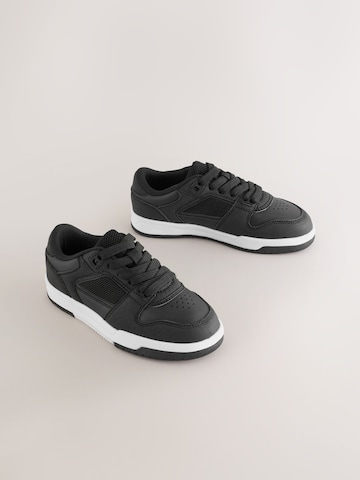Baskets Next en noir