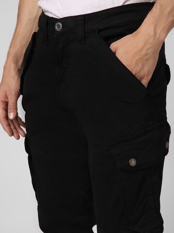 ALPHA INDUSTRIES Tapered Cargo trousers 'Combat' in Black