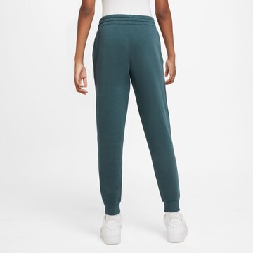 Nike Sportswear Tapered Sporthose in Blau