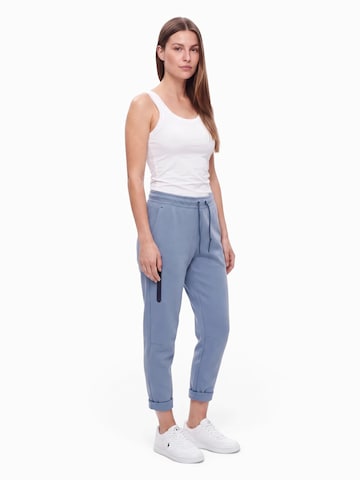 Nike Sportswear Zwężany krój Spodnie 'TCH FLC' w kolorze niebieski