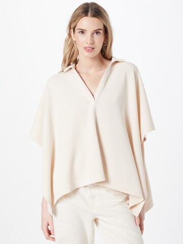 COMMA Cape in Beige: front