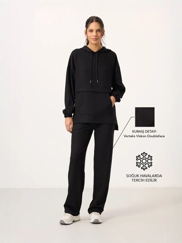 Tuta da jogging di Tommy Life in nero: frontale