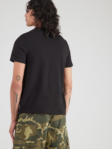 Maglia funzionale 'PRAT' di GUESS in nero