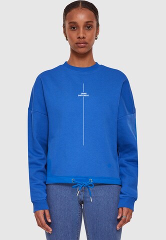 Merchcode Sweatshirt 'Think Different' in Blau: Vorderseite