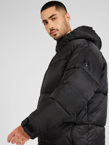 Veste mi-saison 'CABAN' ARMANI EXCHANGE en noir