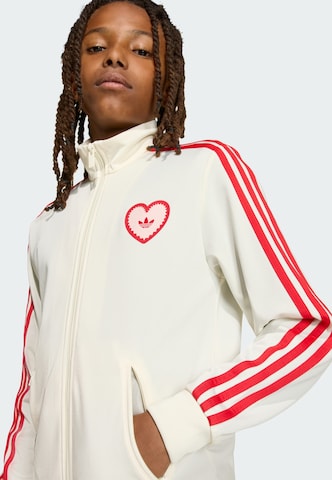 ADIDAS ORIGINALS - Chaqueta de entretiempo 'Firebird Heart' en blanco