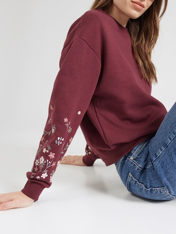 ABOUT YOU Sweatshirt 'Gitta' in Red