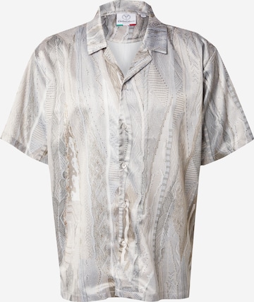 Chemise Carlo Colucci en beige : devant