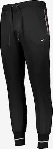 NIKE Sports trousers in Black: front