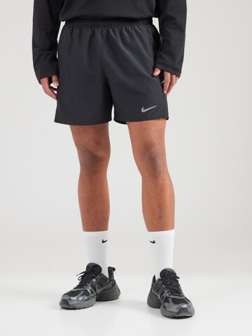 regular Pantaloni sportivi 'MILER' di NIKE in nero: frontale