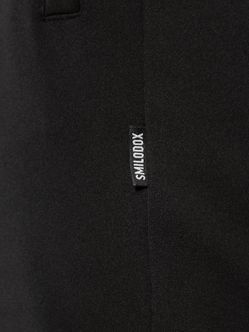 Regular Pantalon ' Damion ' Smilodox en noir