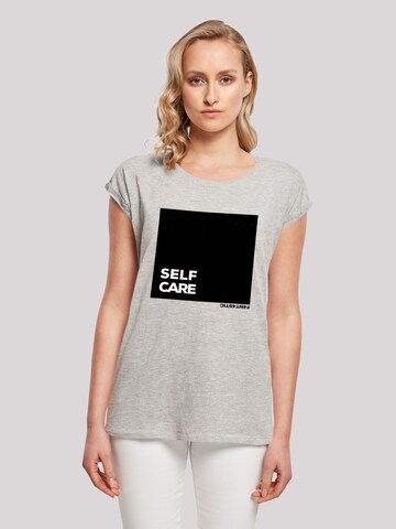 T-shirt 'Self Care' F4NT4STIC en gris : devant