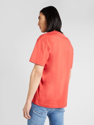 Maglietta 'HERO' di Calvin Klein in rosso
